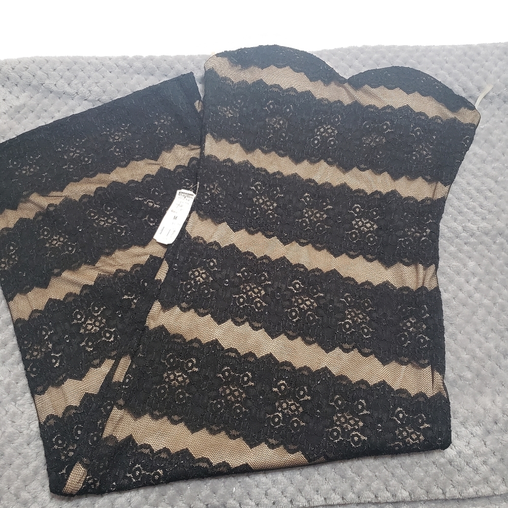 Nude and black dress